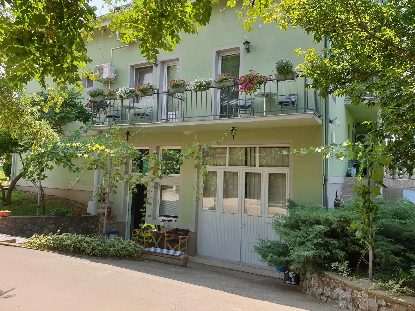 Entrance to Vila Marija with balconies full of flowers